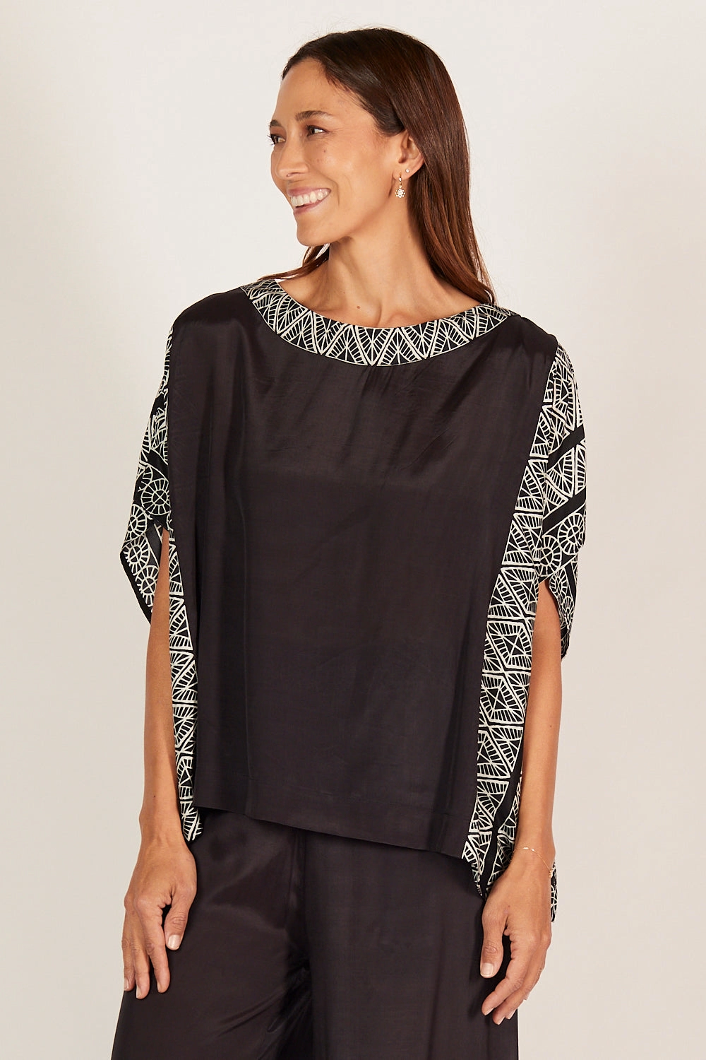 Tina Top in Sunset Palms